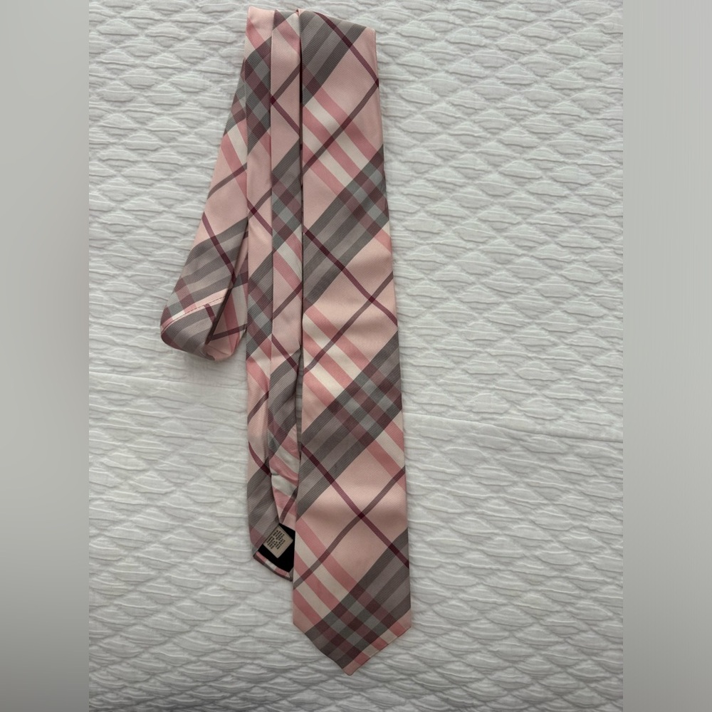 Burberry tie, used and decent condition. Few spots.